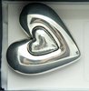 Silver heart shaped magnets